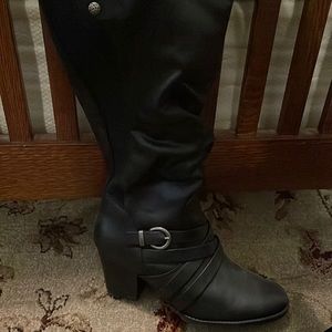 Bare traps tall black boots